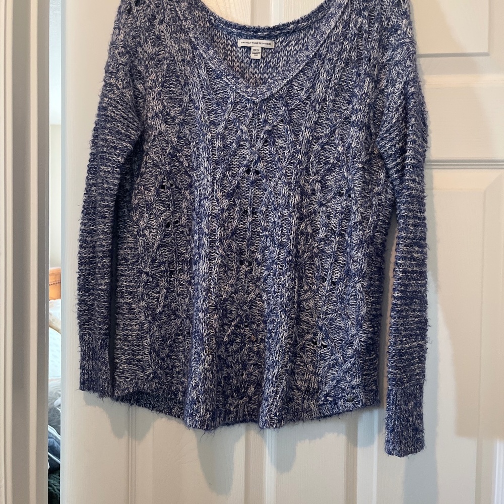 Blue and white sweater